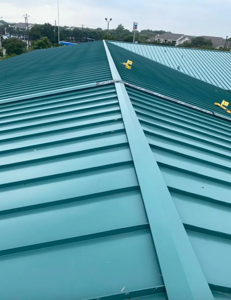 Green commercial metal roof ridge and valley for Metal Roof Repair in Golden